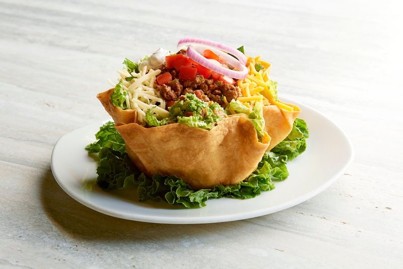 20 80s Party Foods That Look Wrong Now - But Were a Big Deal 13 Taco salad bowl