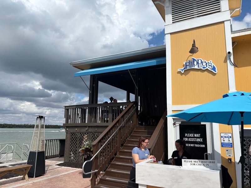 13 Florida Patio Restaurants Where One Meal Easily Turns Into the Whole Afternoon 13 Flippers - Fort Myers Beach, Florida