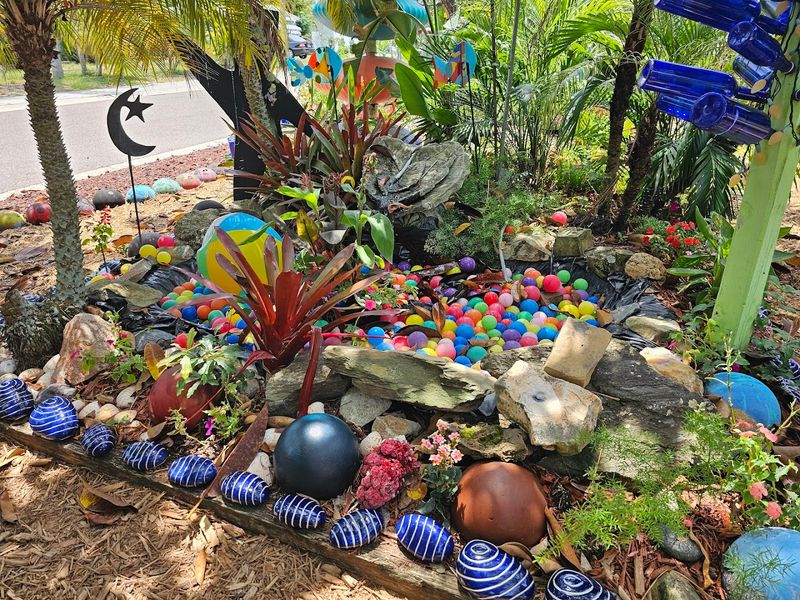 This Wonderfully Bizarre Spot in Florida Is a Kaleidoscope of Colors 5 Bowling Balls and Shimmering CDs as Decorative Art