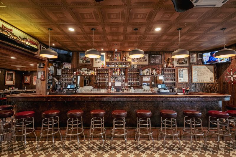 Picon Punch and the Bar You Walk Through to Get Seated