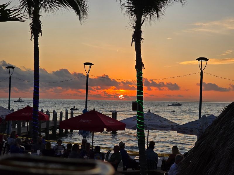 This Florida waterfront restaurant serves sunset views and seafood that easily steal the whole evening 3 Sunset Views That Stop You Mid-Bite