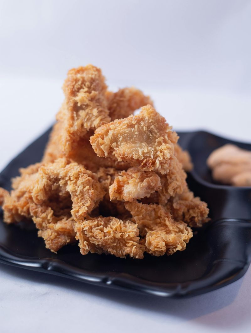 20 Foods That Can Be Surprisingly Hard on Digestion After 40 2 Fried chicken