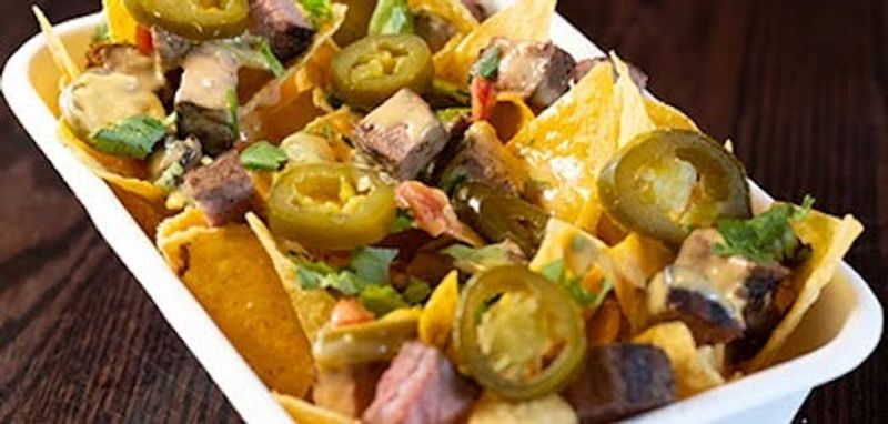The Top Spots For Nachos In Every State 7 Illegal Pete's - Denver, Colorado