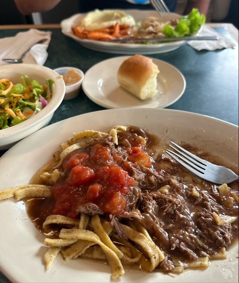 Slow-Cooked Beef Over Wide Noodles with Stewed Tomatoes