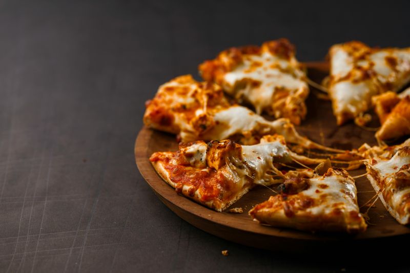 23 Foods That Were Once Special Treats - Now They’re Everyday Choices 8 Cheese pizza