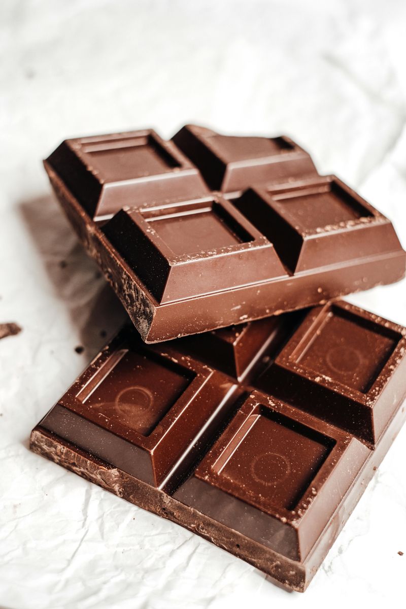 20 Foods That Can Make Digestion Harder After 40 13 Chocolate bars
