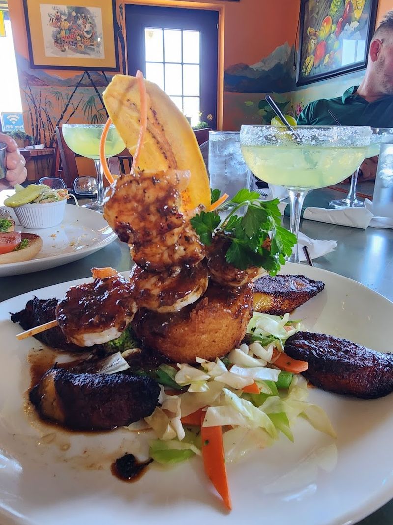 Jerk Shrimp Skewer with Grit Cake and Mango Salsa