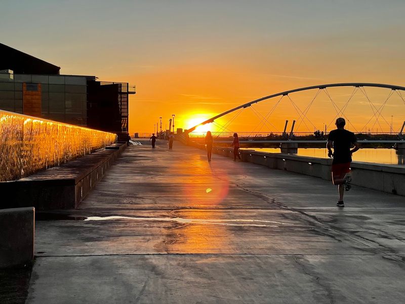 Sunset Walks Along The Water