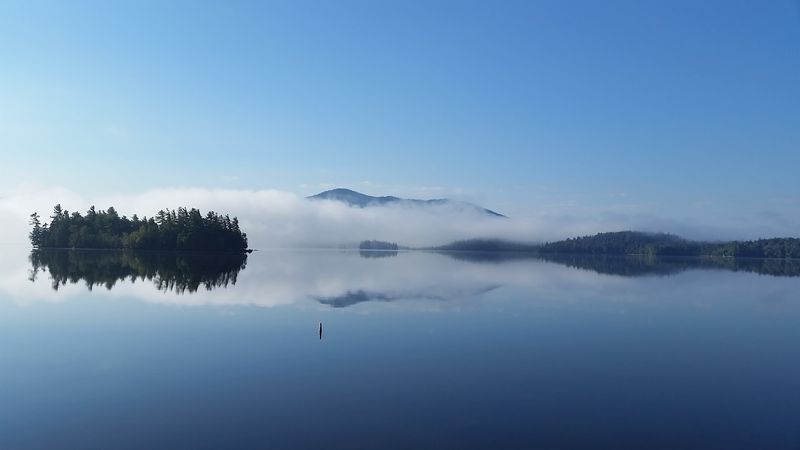 This Beautiful Mountain Town In New York Offers A Slower Pace Of Life 4 Mirror Lake and the Chain of Lakes That Define the Region
