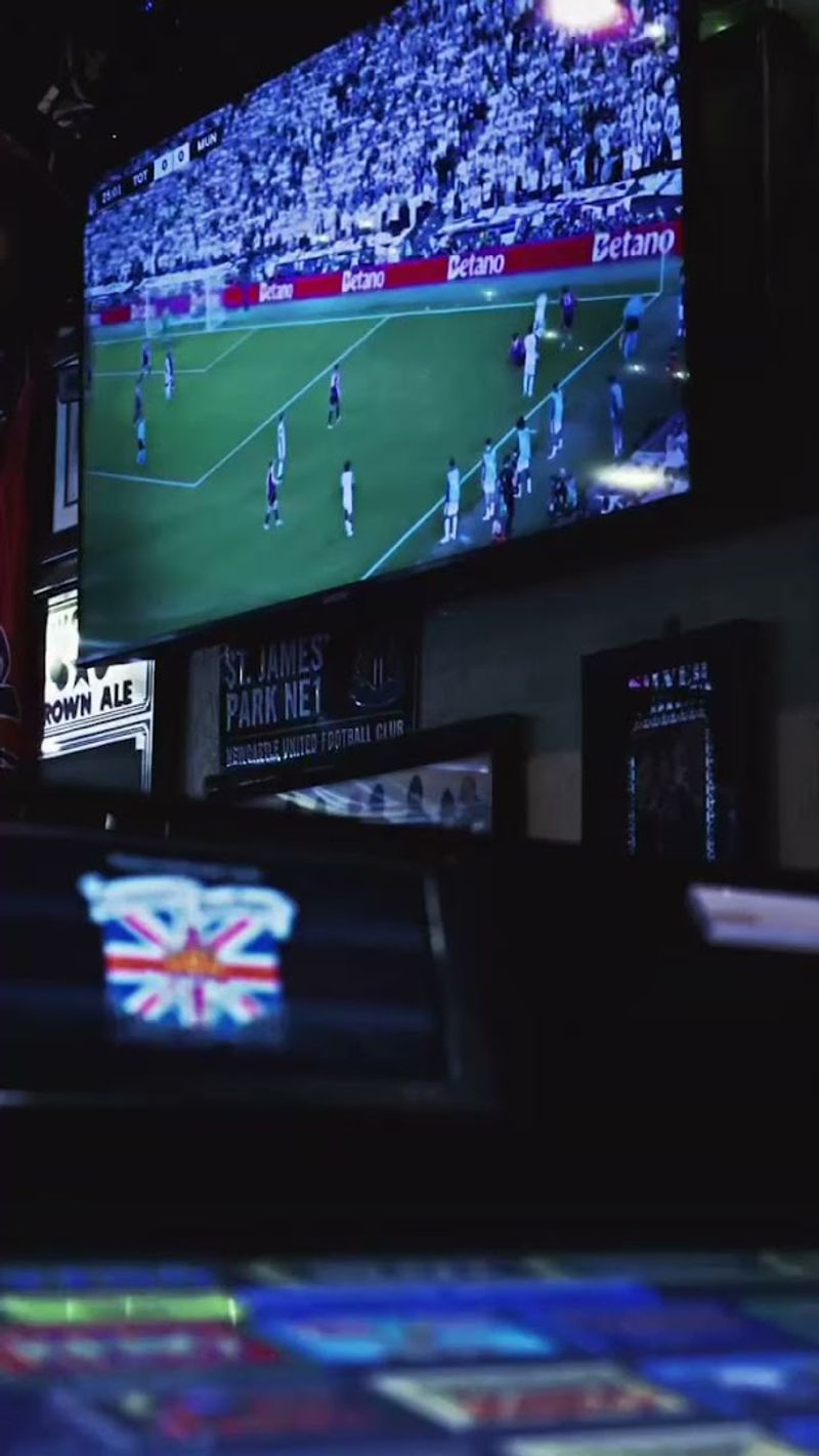 Soccer on TV and Darts on the Board