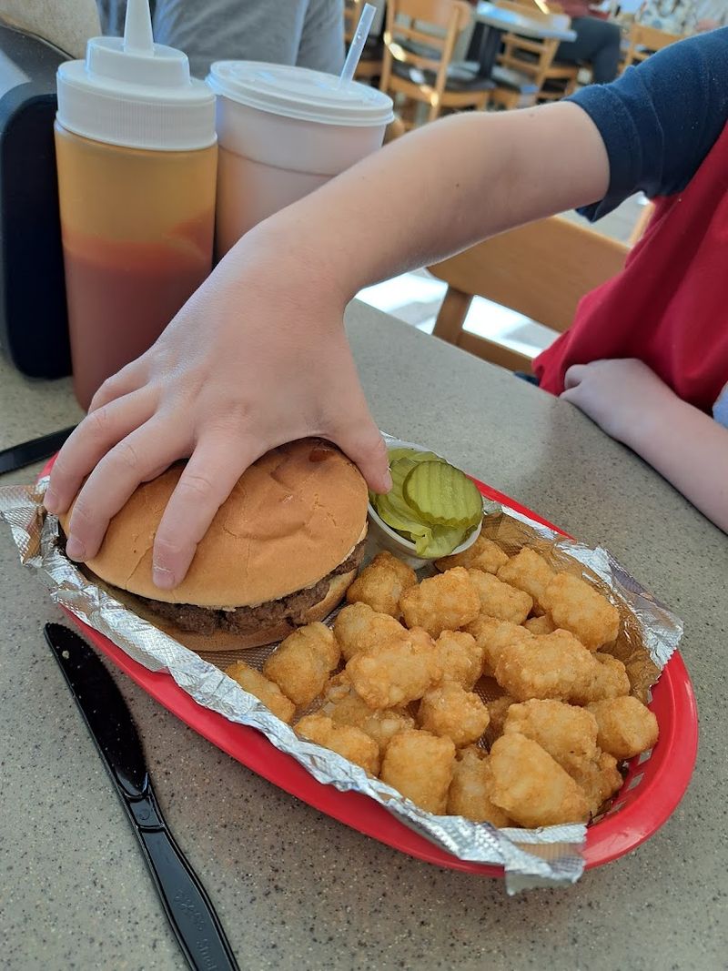 This no-frills Texas spot serves massive cheeseburgers worth traveling for 6 Crispy, Golden Fries and Perfectly Fried Tots on the Side
