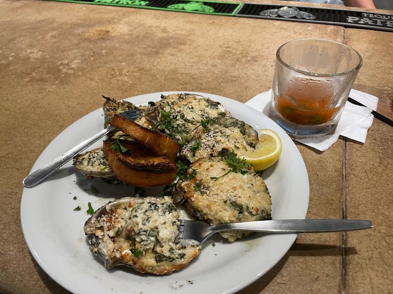 Baked Oysters Topped with Creamed Spinach, Crab, and Parmesan