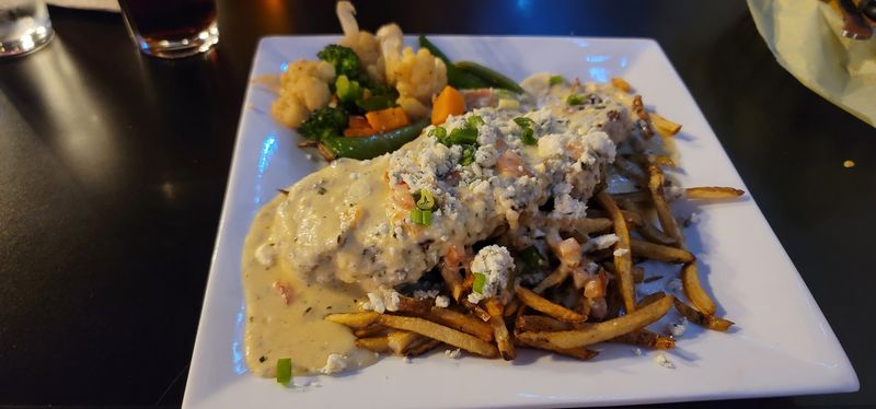 Fondue Steak Over Fries: A Comfort Food Dream