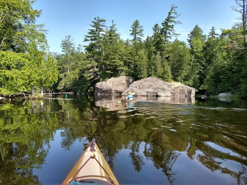 This Beautiful Mountain Town In New York Offers A Slower Pace Of Life 9 Paddling Paradise: Canoeing and Kayaking Through Pristine Waters