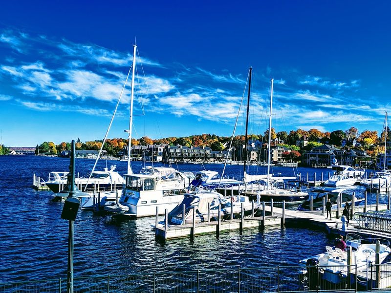 Charlevoix's Harbor: Where Sailboats and Sunsets Collide Charlevoix's Harbor: Where Sailboats and Sunsets Collide