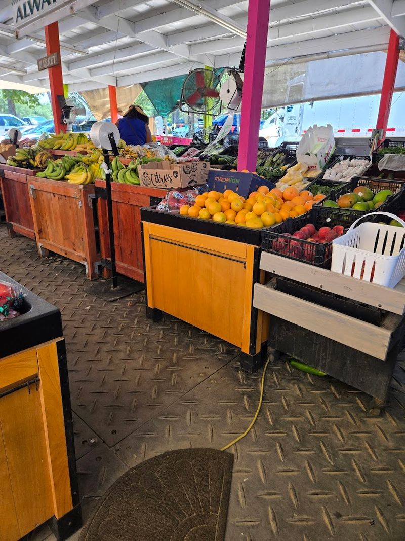 Fresh Produce Stands Stocked With Fruits and Vegetables