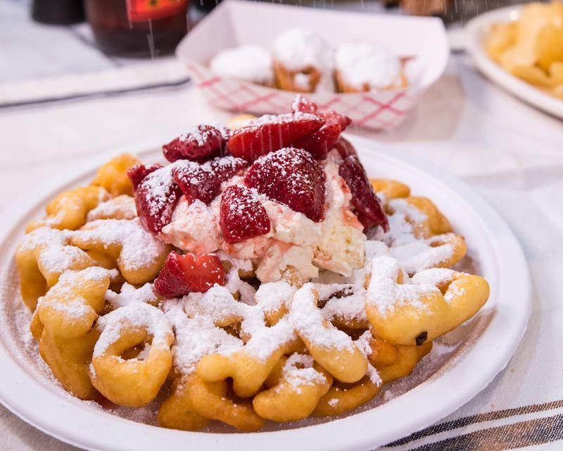 Funnel Cake With Cinnamon Sugar and Whipped Cream Funnel Cake With Cinnamon Sugar and Whipped Cream