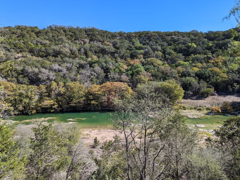 Horseback Riding Through Hill Country Terrain