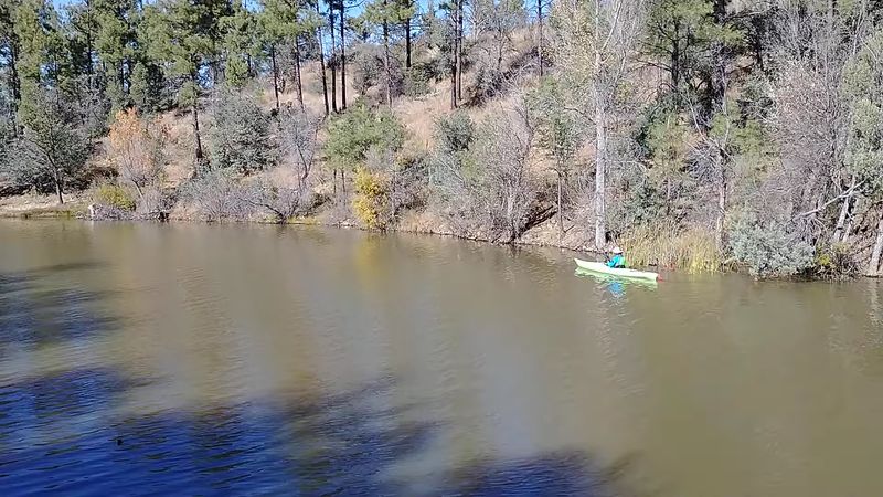 Kayaking and Canoeing on Calm, Peaceful Water
