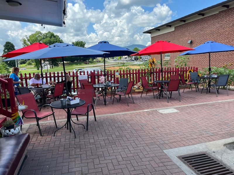 Outdoor Seating with Sunflowers and Mountain Air