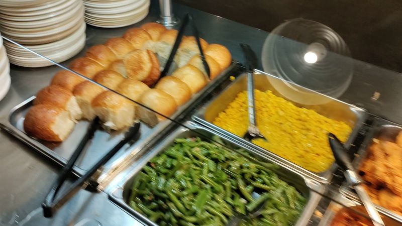 Rolls and Cornbread That Complete the Meal