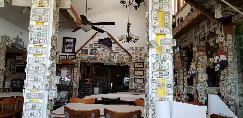 Rustic Atmosphere With Dollar Bills on the Walls
