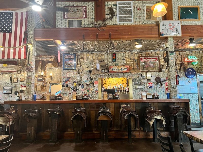 Saddle Barstools and Dollar-Bill Decor