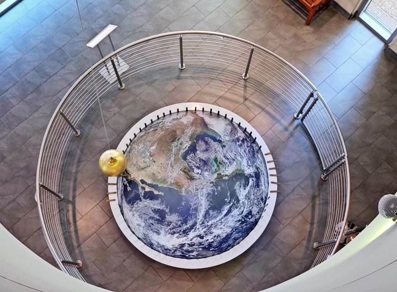 The Mesmerizing Two-Story Pendulum in the Foyer The Mesmerizing Two-Story Pendulum in the Foyer