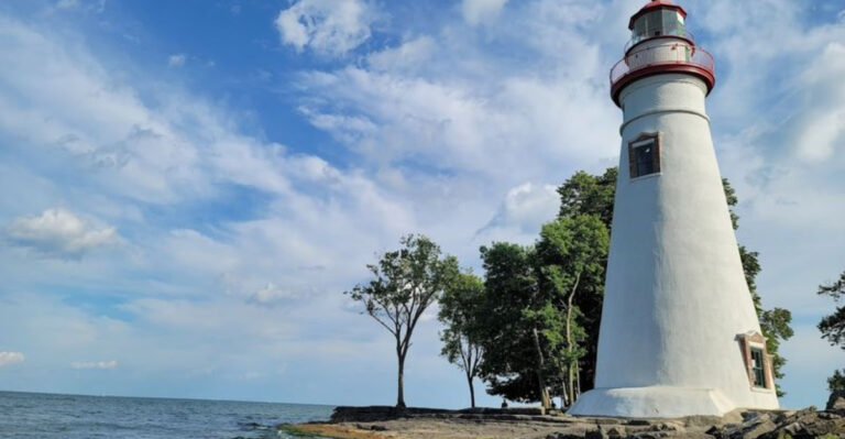 This stunning white lighthouse in Ohio stands on a peninsula filled with prehistoric fossils