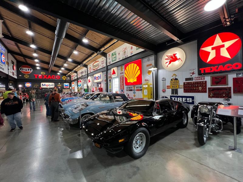 Walls Packed With Vintage Signs and Automotive Memorabilia Walls Packed With Vintage Signs and Automotive Memorabilia