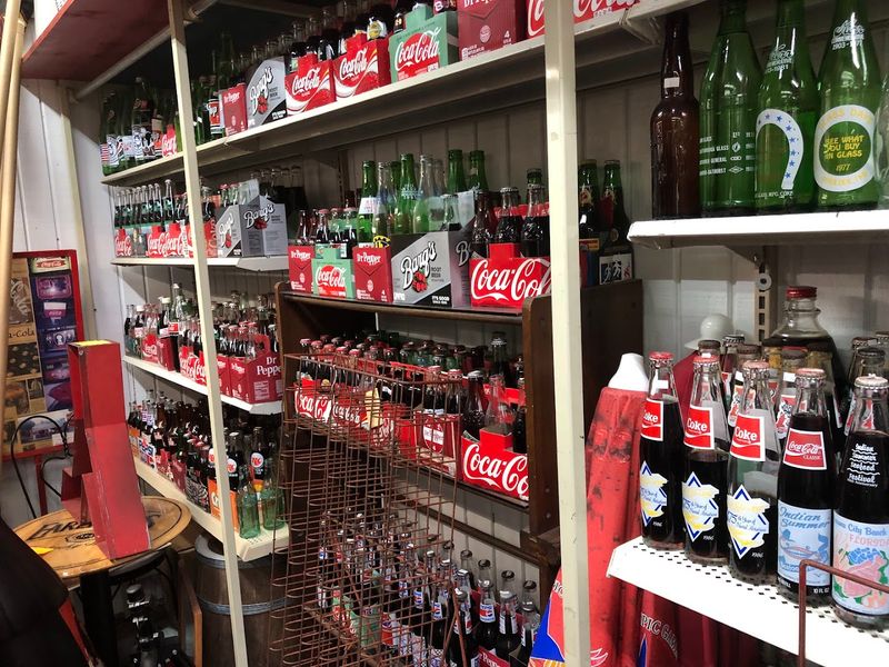 A Collector's Haven for Coca-Cola Bottles and Cans