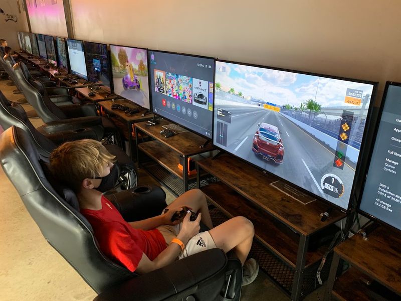 A Long Wall of Consoles for Laid-Back Gaming