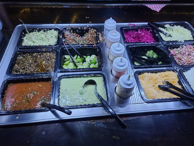 A Salsa Bar Loaded With Roasted Onions