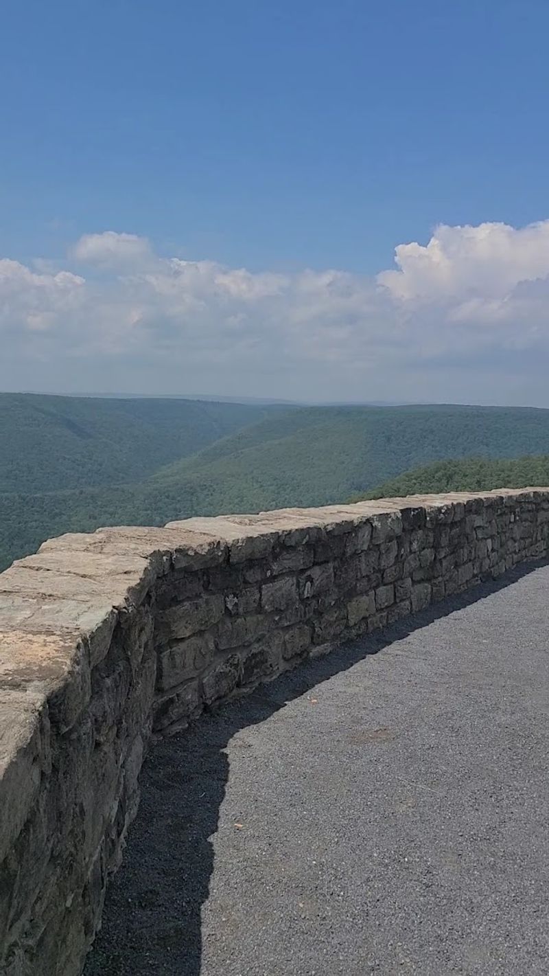 A Winding Mountain Road That Is Half The Adventure