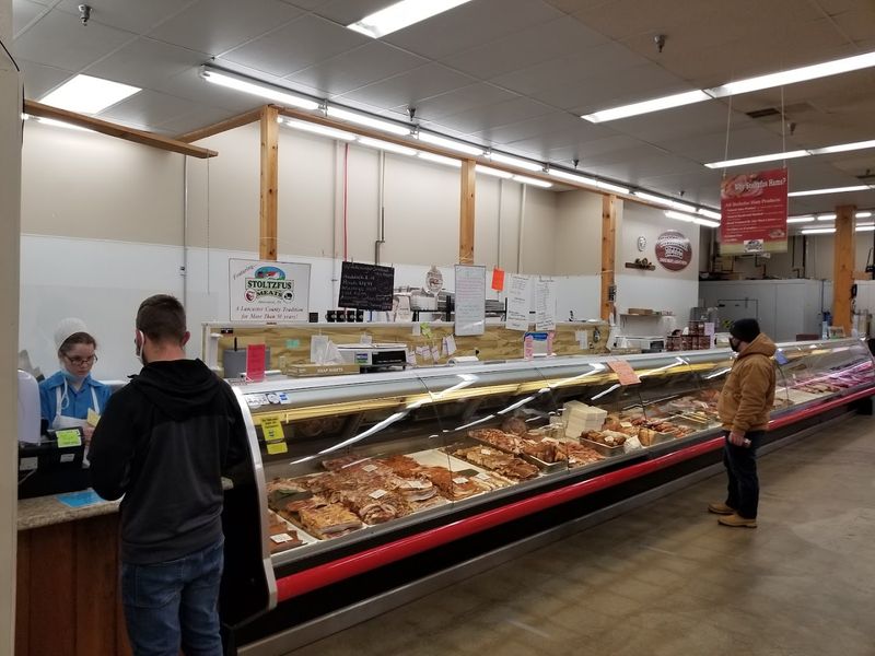 Deli Counter With Lunch Meats and Cheese