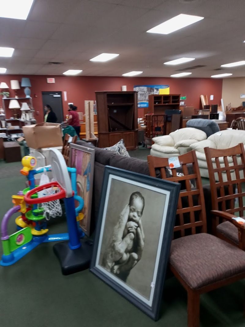 Furniture and Artwork That Fill the Back of the Store