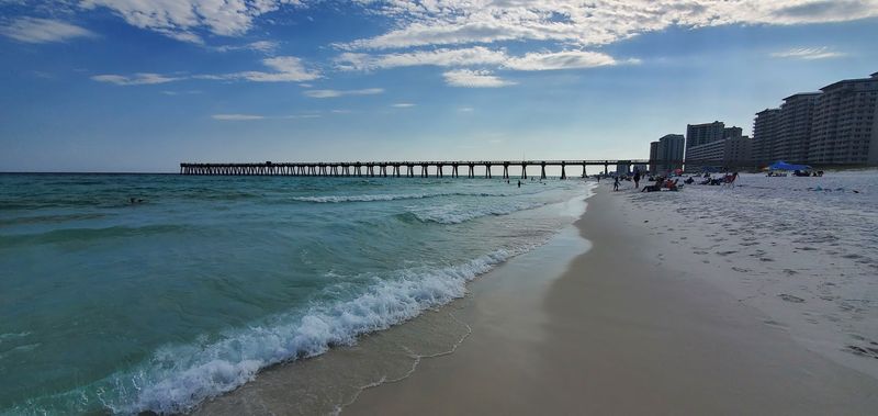 Gorgeous White Sand Beach Surrounding the Pier