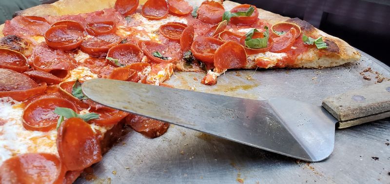 How the Calzone Compares to Lombardi's Famous Pizza How the Calzone Compares to Lombardi's Famous Pizza