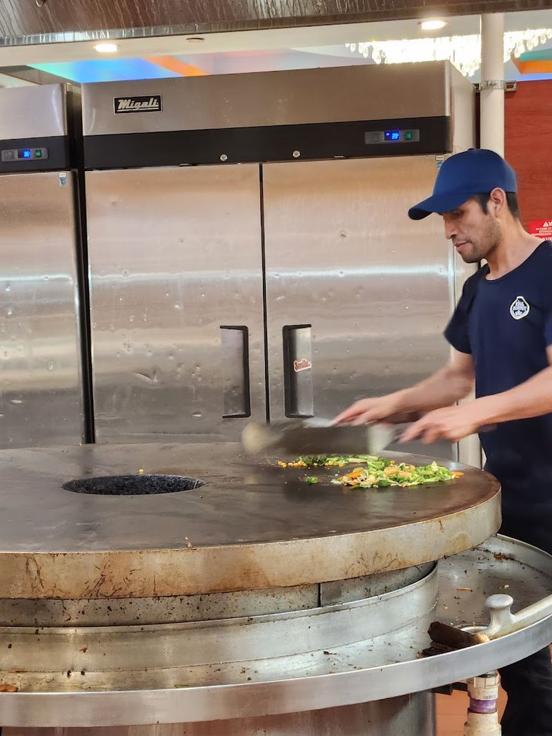 Mongolian Grill Station: Watch Your Food Come to Life Mongolian Grill Station: Watch Your Food Come to Life