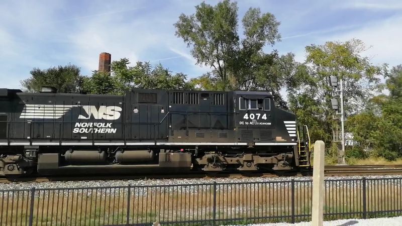 Norfolk Southern Trains Right Next to the Fence