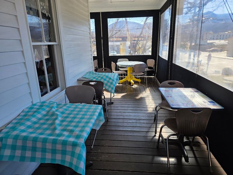 Porch Dining With That Perfect Mountain Atmosphere