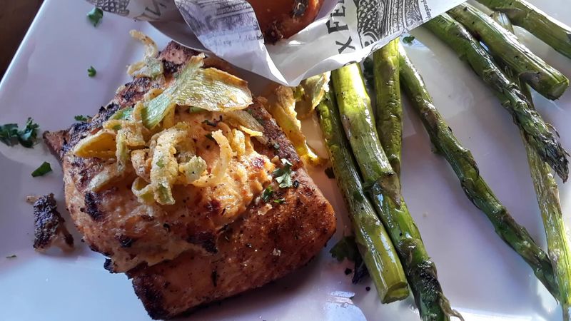 Salmon with Grits and Garlic Butter Spinach