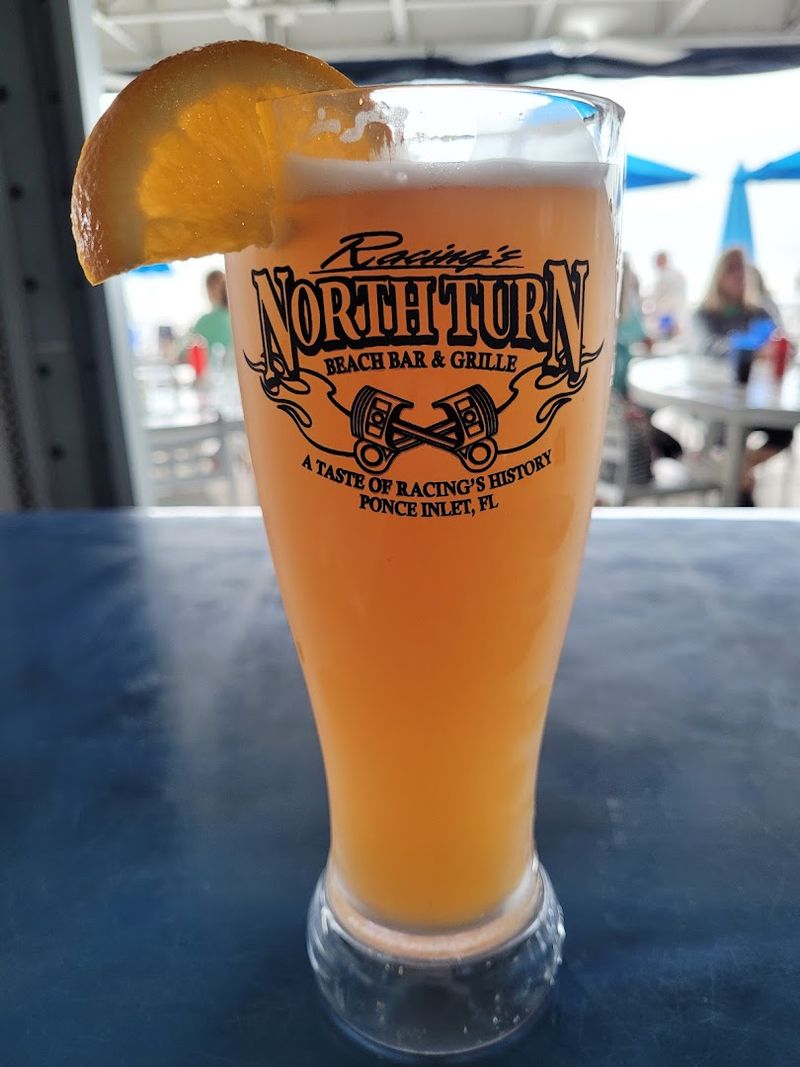 Signature Cocktails Served in Souvenir Hurricane Glasses