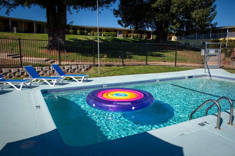 Sparkling Outdoor Pool And Jacuzzi For Unwinding