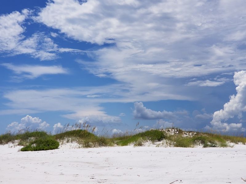 Stunning Natural Dunes That Frame The Shoreline Beautifully Stunning Natural Dunes That Frame The Shoreline Beautifully