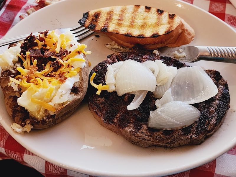 The Baked Potato and Grilled Bread That Complete the Meal