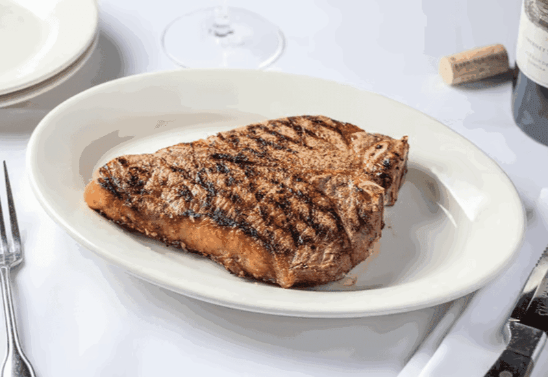 The Iconic Porterhouse Cooked to Absolute Perfection