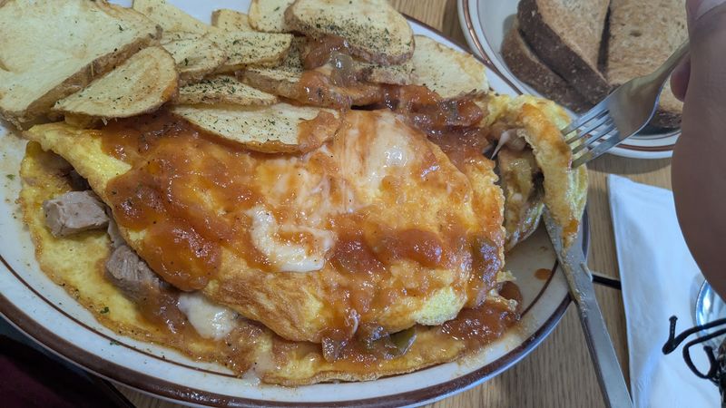 The Kitchen Sink Omelet — A Must-Try Challenge The Kitchen Sink Omelet — A Must-Try Challenge