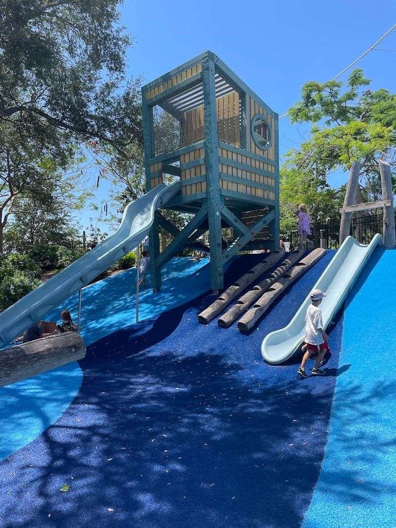 Tree Houses Connected by Slides and Obstacles