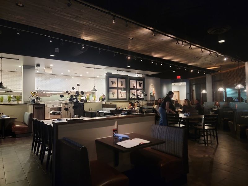 A Cozy Atmosphere With Indoor Booths and an Outdoor Patio A Cozy Atmosphere With Indoor Booths and an Outdoor Patio